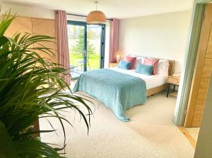 Voodi või voodid majutusasutuse Avalennek toas