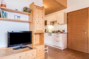 Kuchyň nebo kuchyňský kout v ubytování Huberhof App Rubens