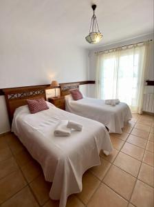 Ένα ή περισσότερα κρεβάτια σε δωμάτιο στο Villa PALMERA