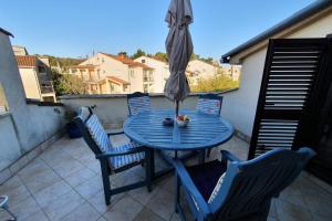 Balkón alebo terasa v ubytovaní Apartment Relax for max 5 persons Funtana close to the beach + 25 fotografií