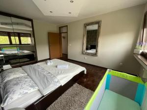 Posteľ alebo postele v izbe v ubytovaní Riverside Luxury Apartment