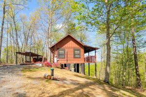 a cabin in the middle of the woods at Cozy Cabin in Sevierville