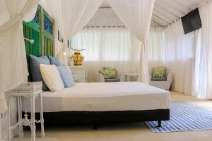 Letto o letti in una camera di Chanteak Bali