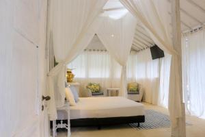 Letto o letti in una camera di Chanteak Bali