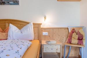 Postel nebo postele na pokoji v ubytování Huberhof App Gala