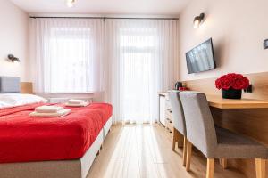 Postel nebo postele na pokoji v ubytování Dom Wypoczynkowy Rena