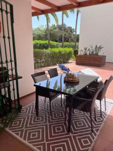 En terrasse eller udendørsområde på Estrelicia II