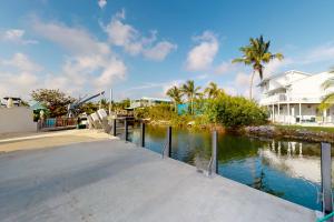 a canal in front of a house at The Mermaid Manor in Cudjoe Key