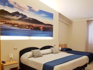 A bed or beds in a room at Il Gabbiano