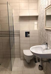 Kúpeľňa v ubytovaní WIEJSKI APARTAMENT W DOMU NAD JEZIOREM