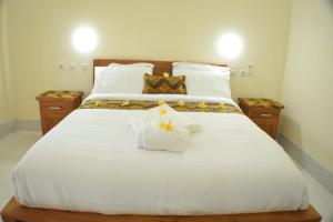Lova arba lovos apgyvendinimo įstaigoje KJ Inn Homestay Senggigi