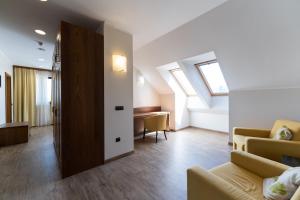 Predel za sedenje v nastanitvi Hotel Arena Maribor