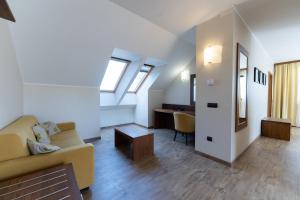 Predel za sedenje v nastanitvi Hotel Arena Maribor