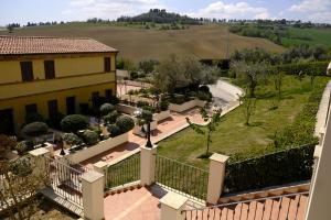 a view from the balcony of a house with a garden at L'Antico Uliveto in Porto Potenza Picena