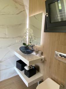 Koupelna v ubytování Apartamentos Turísticos VillaCordido Villaframil Ribadeo