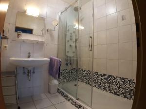 Ένα μπάνιο στο Ferienwohnanlage Bergschlößl Appartement Nr18