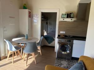 Kuchyň nebo kuchyňský kout v ubytování Apartamentos Turísticos VillaCordido Villaframil Ribadeo