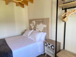 Postel nebo postele na pokoji v ubytování Apartamentos Turísticos VillaCordido Villaframil Ribadeo