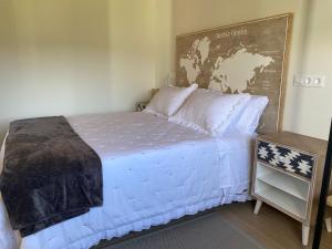 Postel nebo postele na pokoji v ubytování Apartamentos Turísticos VillaCordido Villaframil Ribadeo