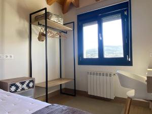 Postel nebo postele na pokoji v ubytování Apartamentos Turísticos VillaCordido Villaframil Ribadeo
