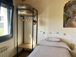 Postel nebo postele na pokoji v ubytování Apartamentos Turísticos VillaCordido Villaframil Ribadeo