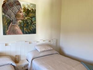 Postel nebo postele na pokoji v ubytování Apartamentos Turísticos VillaCordido Villaframil Ribadeo