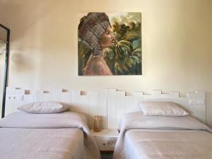 Postel nebo postele na pokoji v ubytování Apartamentos Turísticos VillaCordido Villaframil Ribadeo