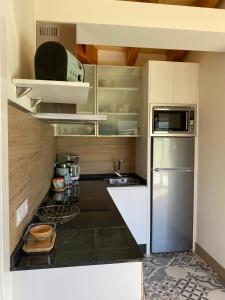 Kuchyň nebo kuchyňský kout v ubytování Apartamentos Turísticos VillaCordido Villaframil Ribadeo