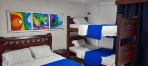 Postel nebo postele na pokoji v ubytování La Marina - Apartamentos Amoblados
