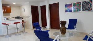 Kuchyň nebo kuchyňský kout v ubytování La Marina - Apartamentos Amoblados