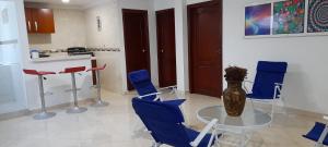 Kuchyň nebo kuchyňský kout v ubytování La Marina - Apartamentos Amoblados