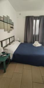 Ένα ή περισσότερα κρεβάτια σε δωμάτιο στο Villa Felice