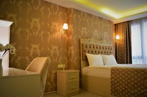 A bed or beds in a room at Istanroom by Keo
