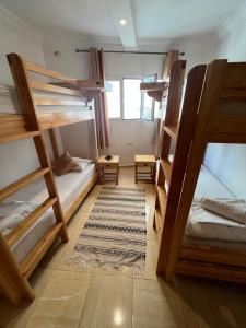Кровать или кровати в номере Dar Surf