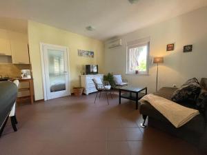 Posezení v ubytování Grand Pool Apartment Ika-Opatija