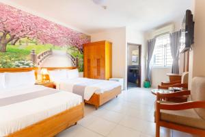Cama o camas de una habitación en Giang Linh Hotel