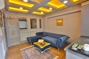 Posezení v ubytování REAL KiNG SUiTE HOTEL