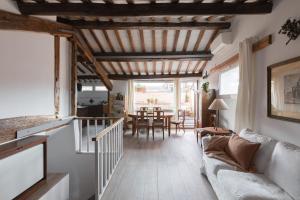 A seating area at Amazing penthouse with terrace and rooftop in Trastevere