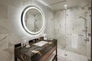 a bathroom with a sink and a mirror at InterContinental San Francisco by IHG in San Francisco