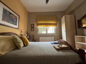 Posteľ alebo postele v izbe v ubytovaní Electra Garden House
