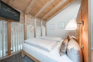 Posteľ alebo postele v izbe v ubytovaní Hotel Andy 4 Sterne Superior + 37 fotografií