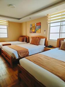 Letto o letti in una camera di Hotel Carolina Montecarlo