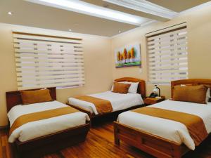 Letto o letti in una camera di Hotel Carolina Montecarlo