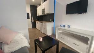 Kuchyň nebo kuchyňský kout v ubytování Cozy Nook