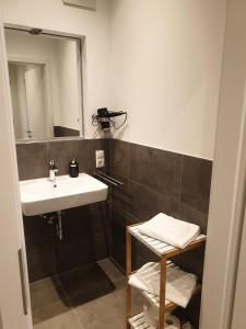 Kylpyhuone majoituspaikassa Ferienwohnungen am Aeppelsberg