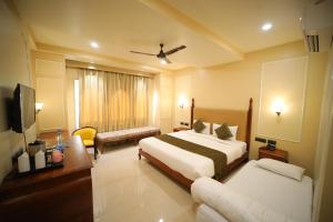Cama o camas de una habitación en The Taj Vista - Agra