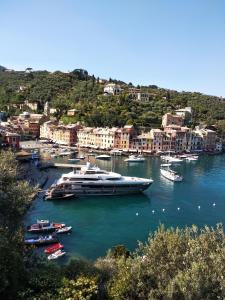 a large boat is docked in a harbor at La Casetta - Near the sea & free parking in Rapallo