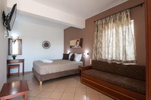 A bed or beds in a room at Mari Helen