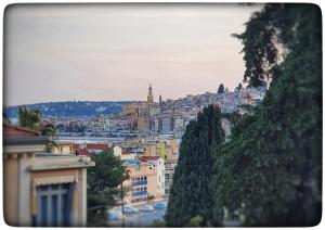 a city view of a city with buildings at Le Vallaya Suites & Spa in Menton