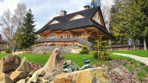 Κήπος έξω από το Osada Jaworzyny Domek Groń z Jaskinią SPA